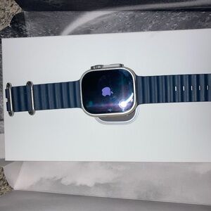 Apple Smartwatch with Navy Band and Silver ultra titanium series 3